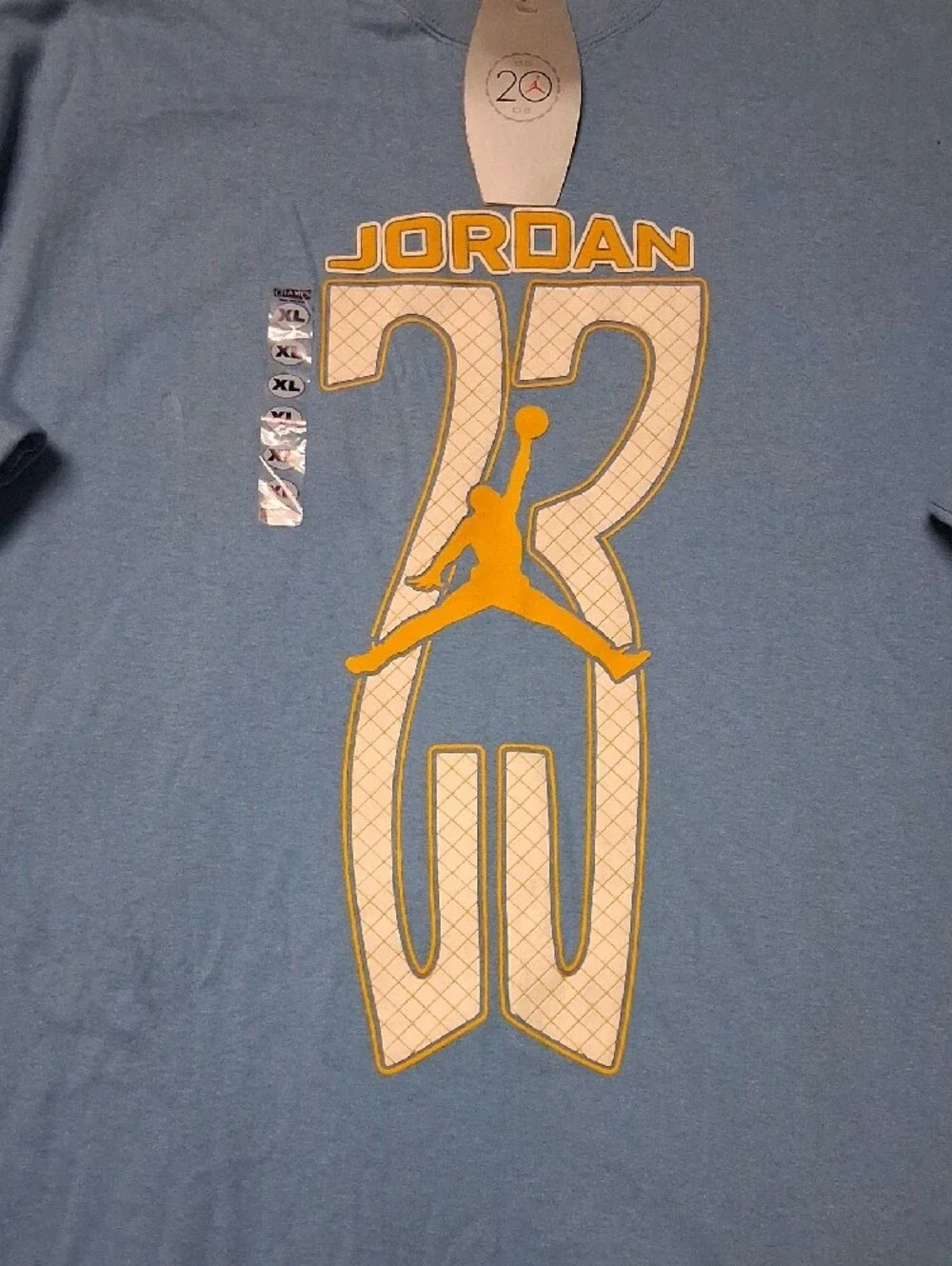Jordan Men’s Light Blue Short Sleeve Tee with Yellow Graphic